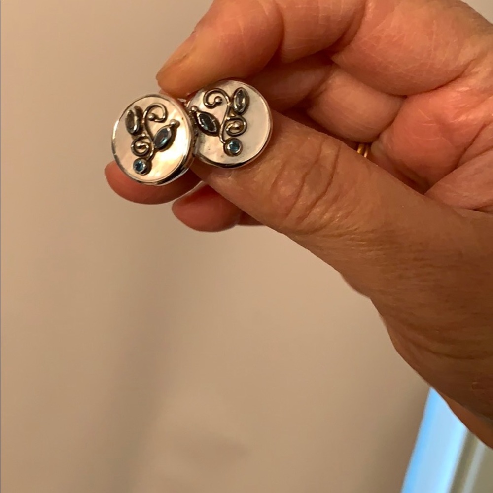 Sterling silver pierced earrings with blue topaz
